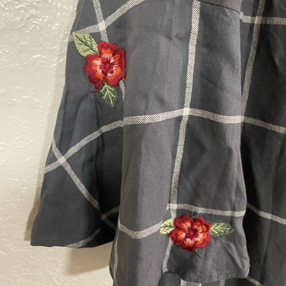 Gray dress with white lines and embroidered bell sleeves